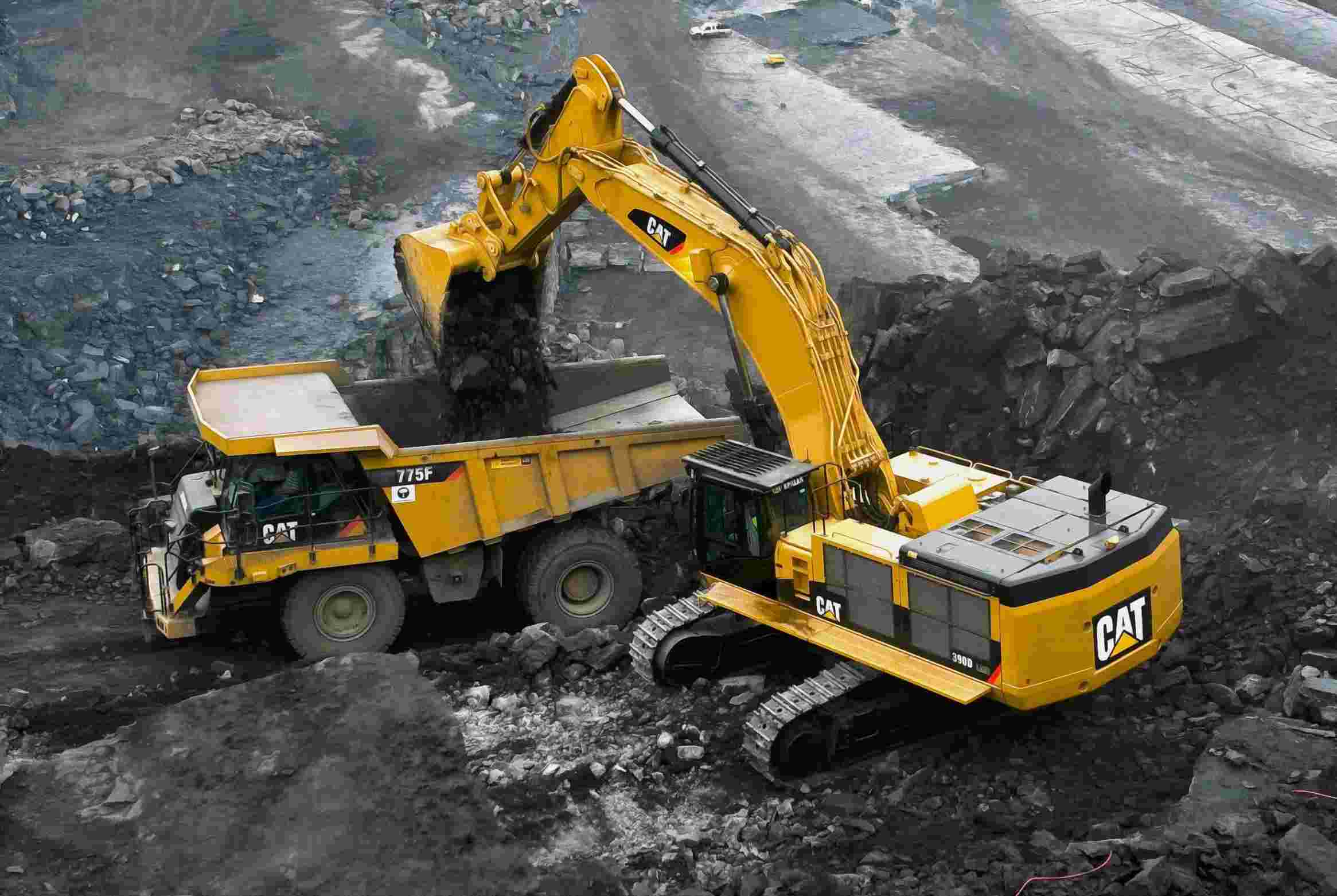 Coal, Iron Ore, Ash, etc. Loading onto Wagons by Deploying Pay loaders.